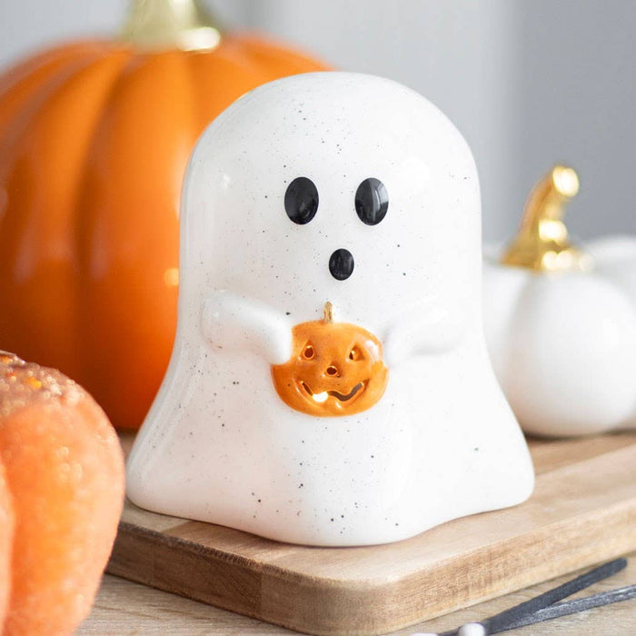 Spökformad värmeljushållare med pumpa